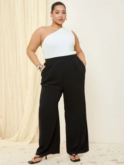 - broek met elastische taille en wijde pijpen*Friends Like These Online