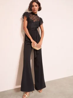 - jumpsuit van kant en scubamix met ruches aan de mouwen*Friends Like These Clearance