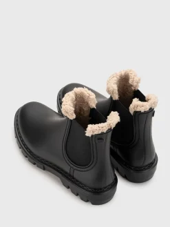 - Rock enkellaarsjes met imitatiebontvoering en enkellengte.*Igor Outlet