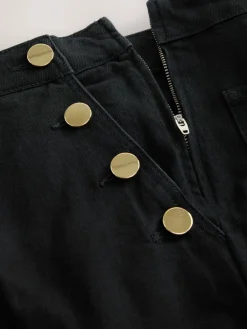 - Jeans met wijde pijpen en gouden knopen aan de voorkant*Next Sale