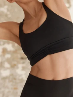 - Medium impact sportbeha met bandjes achter*Next Sale