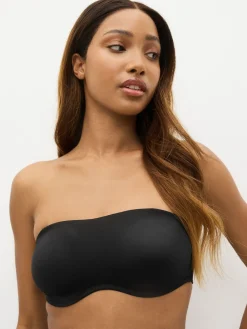 - Minimaliserende strapless bandeaubeha zonder vulling in cupmaat DD+*Next Clearance
