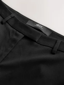 - Op maat gesneden smalle broek*Next New