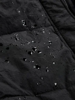 Zwart - Regenbestendige bodywarmer met capuchon en gebreide kraag*Next