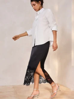 - Satijn Midi-rok met kanten afwerking*Next