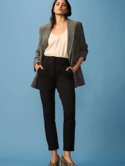 - Smalle vormgevende broek*Next Best