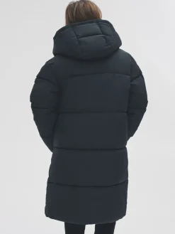 - Lange gewatteerde midi-jas met capuchon*The Set Hot