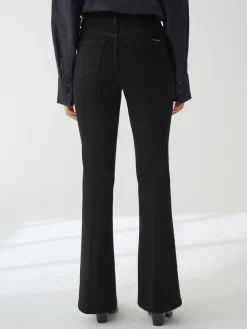 - Zandloper superzachte jeans met uitlopende pijpen*Next New