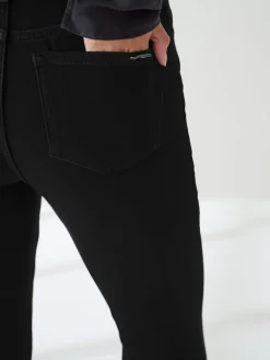 - Zandloper superzachte jeans met uitlopende pijpen*Next New