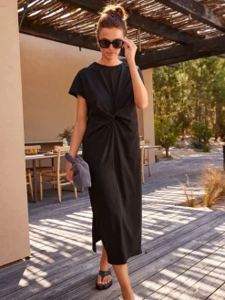 - Zomerse T-shirtjurk met draai en korte mouwen*Next Sale