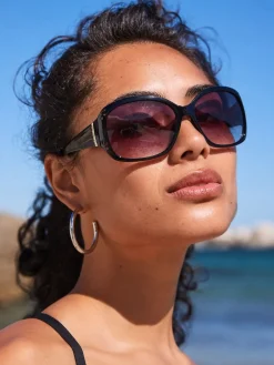 - Zonnebril met uitsnijding en ombré-effect*Next Online