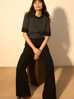 Zwart met stippen - Superzachte gebreide top met korte mouwen*Next Online