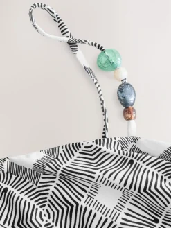 Zwart/crème met aztekenprint - Asymmetrische bikinitop met kralen*Next Hot