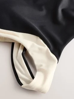 - Hoogsluitende halterbadpak met buikcorrectie*Next