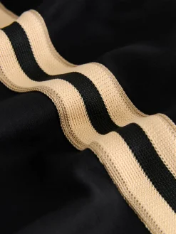 Zwart/neutraal - Slinky trainingsbroek met wijde pijpen en zijstrepen*Next Outlet